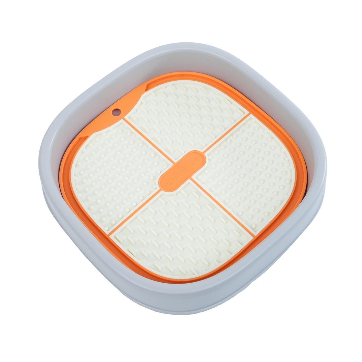 a orange lick mat is set up on a lick holder